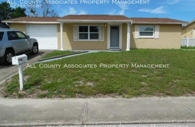 9821 Gray Fox Ln - 9821 Gray Fox Lane, Jasmine Estates, FL 34668