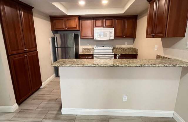 BEAUTIFULLY UPGRADED 1 STORY CONDO photos photos