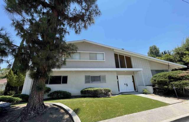 SOUTH OF THE BLVD. HOME IN WOODLAND HILLS! photos photos