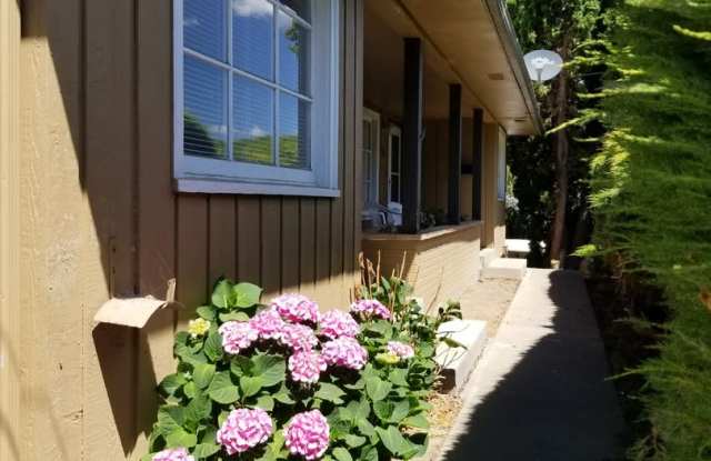 Occupied, do not disturb tenants. 2br duplex with carport and stackable washer/dryer included! photos photos