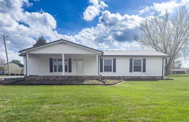 Spacious 3-Bedroom Home with Huge Yard, Covered Porches & Storage Building photos photos