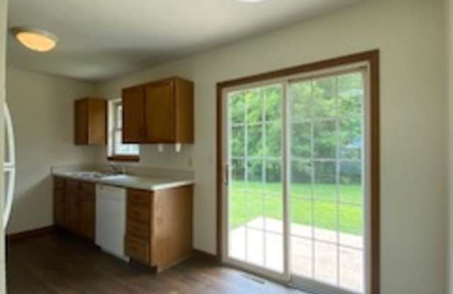 $500 OFF FIRST MONTH RENT - 3 Bedroom Home with 2 Car Attached Garage! - 819 Colonial Manor Drive, Goshen, IN 46526