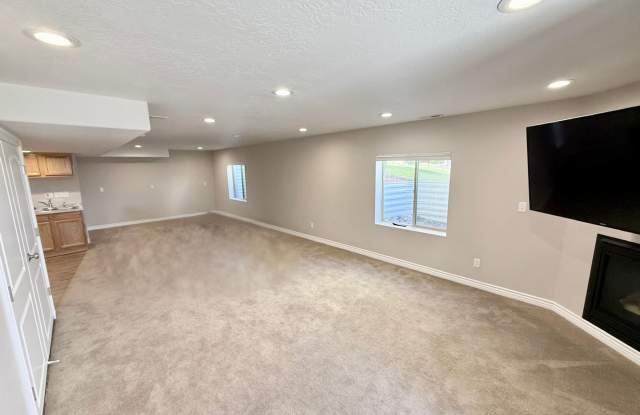 2 Bed / 1 Bath Basement Apartment Near Bangerter Highway - Private Entrance & All Utilities Included photos photos