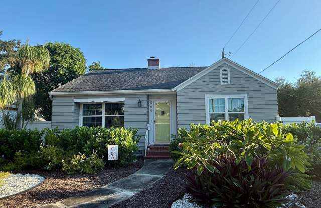CHARM, CHARACTER & LOCATION — TWO FIREPLACES, BEAUTIFUL HARDWOOD FLOORS & EXPANSIVE OUTDOOR LIVING NEAR CRESCENT LAKE! Gallery 1