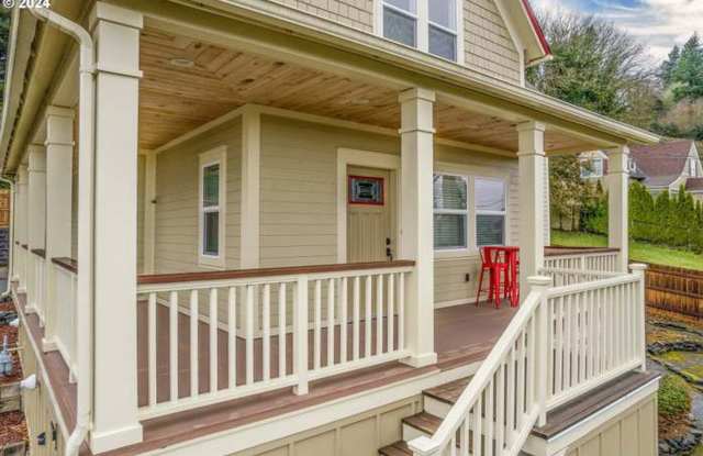 Beautifully updated, furnished home with wrap around porch and Columbia River Views! photos photos