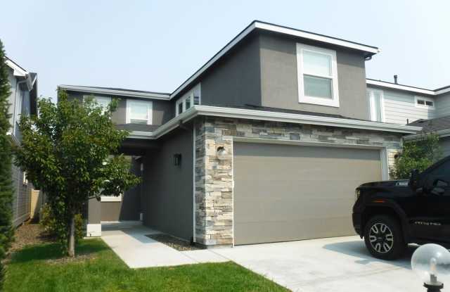 Spectacular newer 3 bed 2.5 bath custom home just off Eagle Rd and Pine Ave in the new Pine Subdivision. photos photos