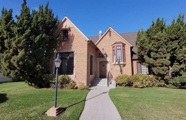 Brick English Tudor Single Family Home photos photos