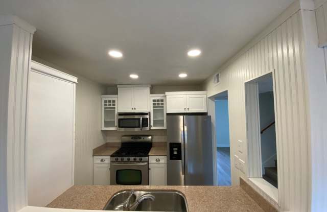 Tastefully Renovated Townhouse Available to Show!! photos photos