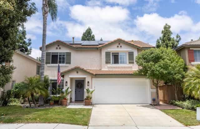 Gorgeous upgraded 4 bed 2.5 bath 2,216 sqft home with Remodeled Kitchen, Hardwood Floors, Tesla Solar Panels in River Ranch available for in Late August! photos photos