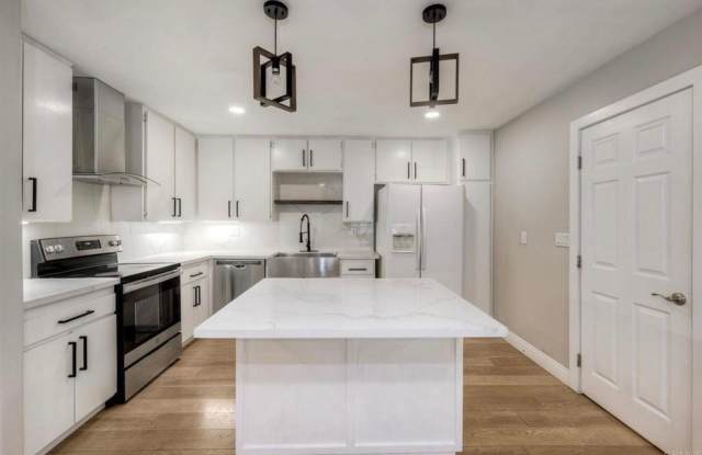 Available Now! Stunning Fully Remodeled 4-Bedroom / 2- Bath Duplex home in Spring Valley Gallery 1