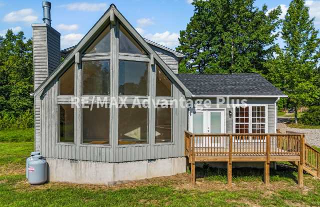 Picturesque 3-Bedroom Home with Cathedral Windows and Private Setting! photos photos