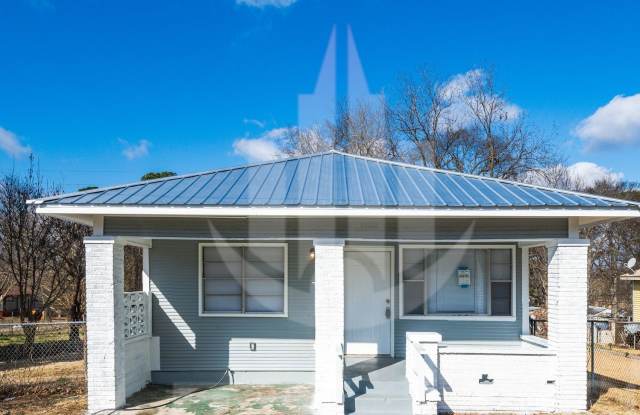 Charming 2-Bedroom Home with a Huge Kitchen & Fenced Backyard! Gallery 1