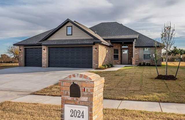 Modern 4-Bed, 2-Bath Mustang Home with 3-Car Garage! photos photos