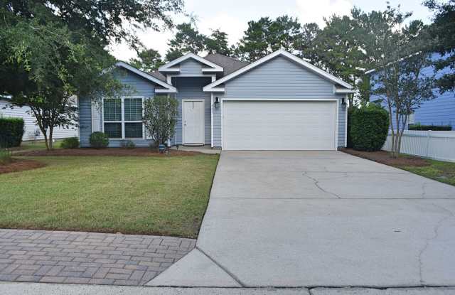 Roomy 4 bedroom 2 bath home in Schooner Landing backs up to the playground/pool area. photos photos