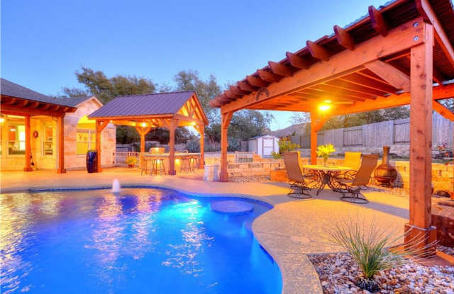 Exquisite Salt Water Pool Property - Four Bedroom Home with Media Room, Office, and Community Amenities photos photos