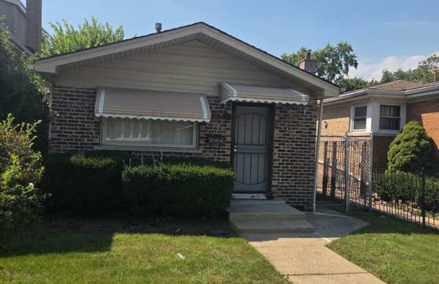 Spacious 5-Bedroom Raised Brick Ranch with Fenced Backyard Gallery 1
