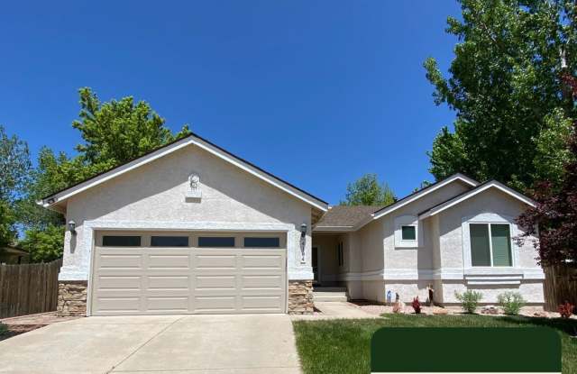 *COMING SOON* Beautifully Upgraded Rancher with Finished Basement and Stunning Backyard! Pet Friendly in 80916! photos photos