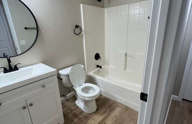 Johnson Ranch, 3 bed, 2 bath, single story, remodeled: wood tile flooring Gallery 4