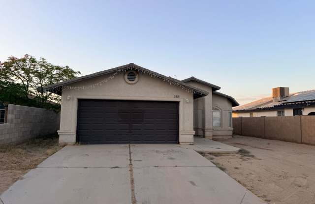 Three Bedroom Home with Two Car Garage and Fenced Lot in San Luis AZ. photos photos