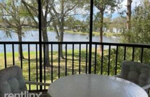 202 Woodlake Wynde - 202 Woodlake Wynde, East Lake, FL 34677