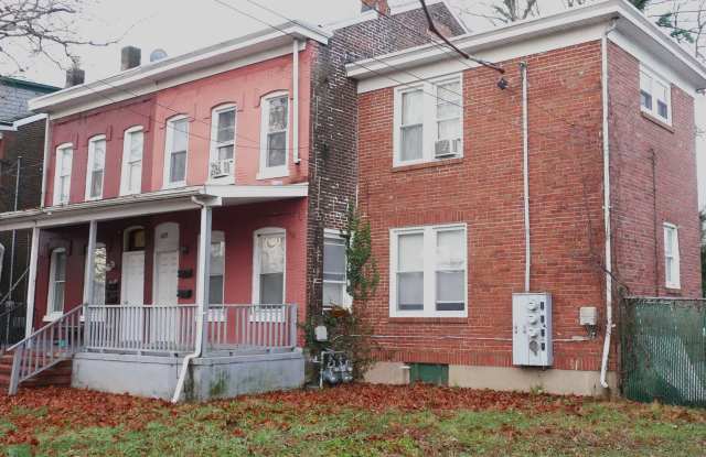 Updated large 2BR 1BA home with driveway parking, large fenced yard and covered porch. photos photos