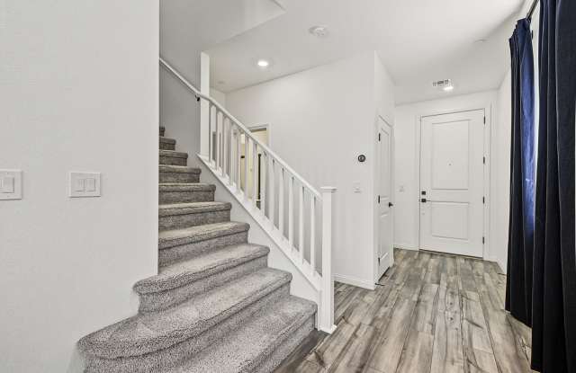 5-Bedroom Home for Rent in Gated Kyle Canyon Community | Downstairs Bedroom | Modern Kitchen Gallery 4
