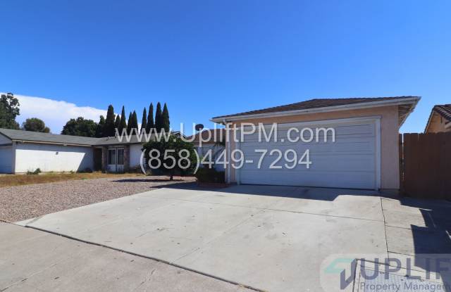 4 Bedroom 2 Bath Home in the Heart of Mira Mesa. MOVE IN SPECIAL $300 OFF FIRST MONTH'S RENT - 8723 Hillery Drive, San Diego, CA 92126