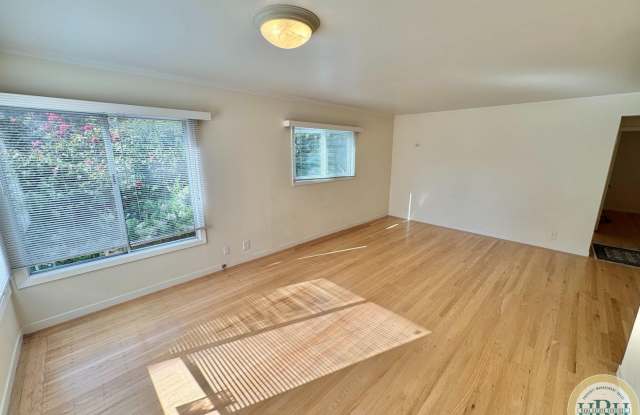Spacious  Bright 2BR|1BA w/ One Garage Parking Spot Included photos photos