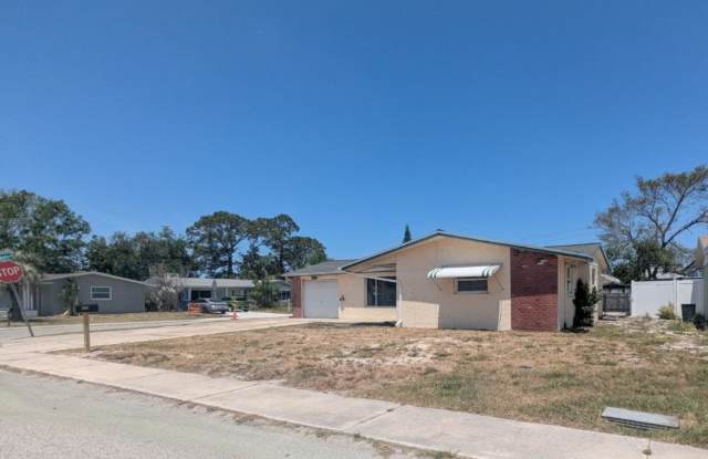 CORNER LOT 2/2 over 1246sf with NEW lvp floors, FRESH paint, open floorplan, primary suite with private bath!! photos photos