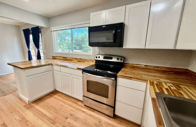 Charming Greeley Home with Spacious Living Areas & Convenient Location Gallery 1