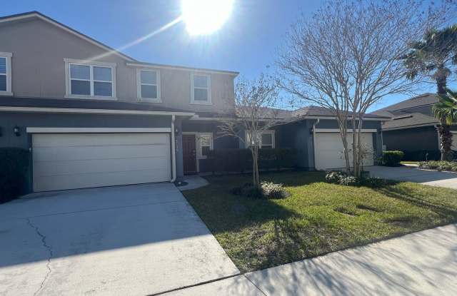 Come home to spacious living and friendly amenities in the heart of Oakleaf Plantation's gated community Gallery 1