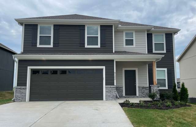 Stunning 4 Bedroom Available Now! - 9142 Southwest 2nd Street, Blue Springs, MO 64014