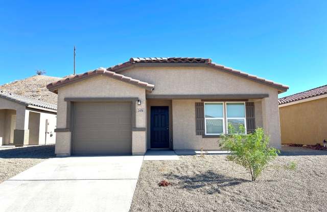 Brand new 3 Bedroom, 2 Bathroom Home in New Bullhead Community! MOVE IN SPECIAL, 1 MONTH FREE RENT!!! *Security Deposit Alternative Available* - 2454 Tapatio Drive, Bullhead City, AZ 86442