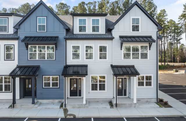 **OFFERING RENT DISCOUNT PROMOTION FOR FIRST 6 MONTHS** New Construction 4BD, 3.5BA Raleigh Townhome in a Great Location photos photos