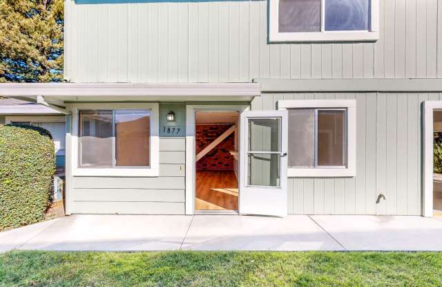 Lovely Two Bedroom One Bath Two Story Condo with Carport & Laundry Facility Gallery 4