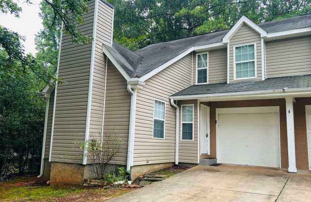 Welcome home! Great location! 2 bed, 1.5 bath, large kitchen, parking for 2, lots of privacy, W/D hookups, must see! photos photos