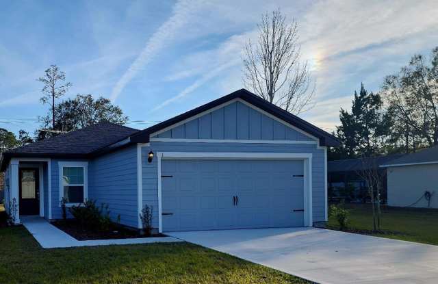 Brand New 3 Bed, 2 bath with 2 car garage in Palm Coast minutes from shopping and the beach photos photos