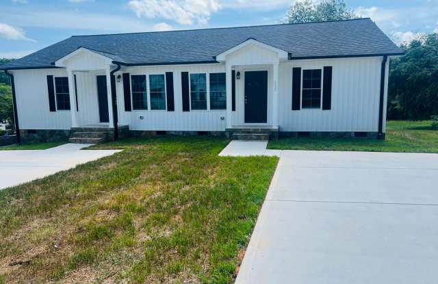 Available May 27th, 2025. 1 year old duplex within walking distance to downtown Maiden! photos photos
