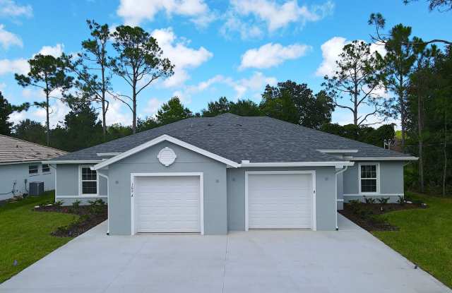 Roomy 3 Bed 2 Bath Duplex Home for Rent w Screened Lanai in Palm Coast! photos photos
