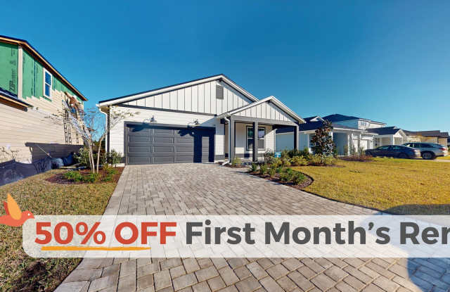 Like-new 4 bedroom, 2 bathroom home in Saint Johns features a coastal-style exterior! - 148 Coordinate Lane, St Johns, FL 32259
