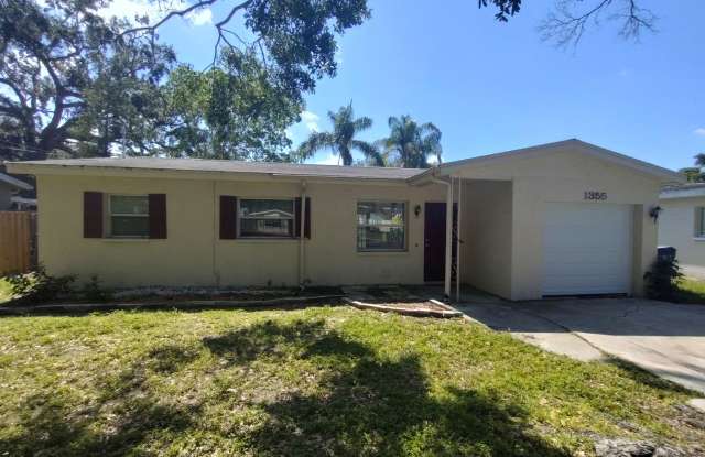 Charming 3-Bedroom Home with 1 Bath and 1-Car Garage in the Heart of Dunedin! photos photos