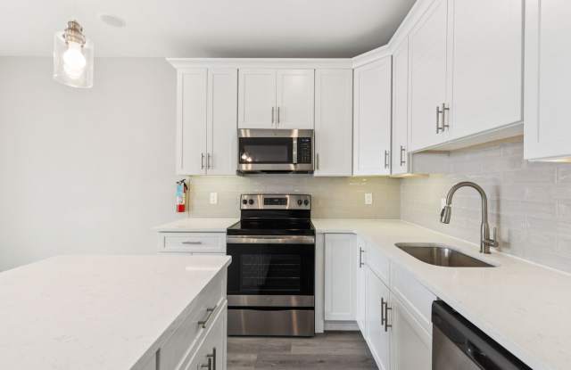 Chic 2-Bedroom Rental with Stunning Rooftop Deck  Modern Amenities in West Kensington! photos photos