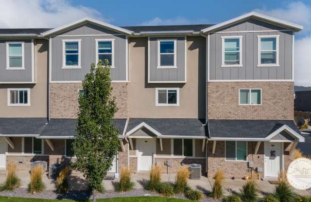 Up to $500 off first month rent | Charming 3-Story Townhomes in Eagle Mountain! photos photos