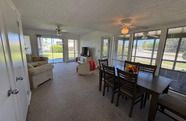 FULLY FURNISHED 2-Story Townhouse on Canal – Pool, Golf Views & ALL Utilities Included! photos photos
