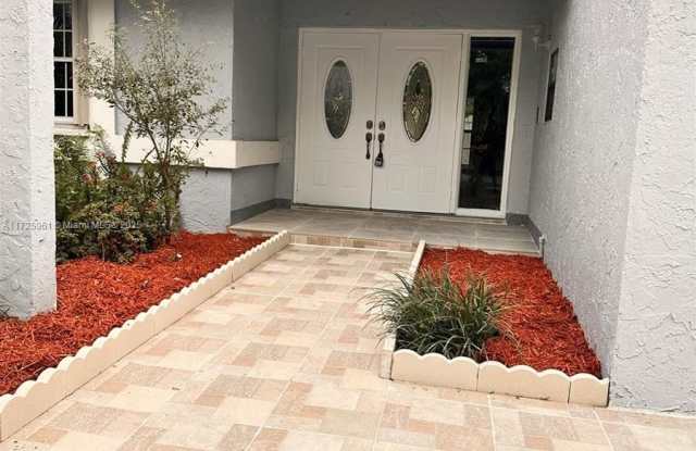 7310 NW 44th Ct - 7310 Northwest 44th Court, Lauderhill, FL 33319