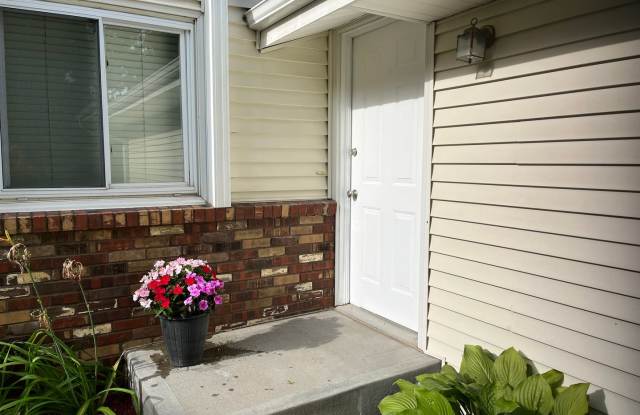 Spacious 2-Bedroom Millard Townhome with Attached Garage, Basement & Private Backyard Gallery 1