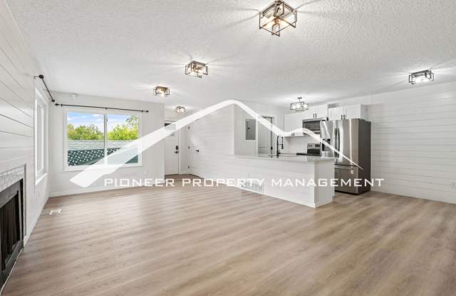 Remodeled 2 Bedroom Condo with Covered Parking, In Unit Laundry, AC and Private Storage Gallery 4