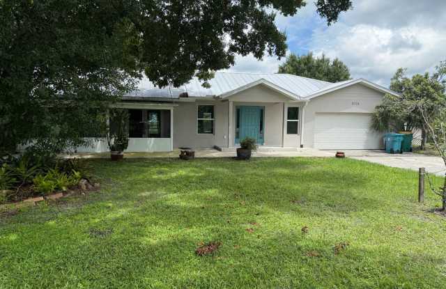Waterfront Oasis Awaits! 3/2 with Attached Garage photos photos