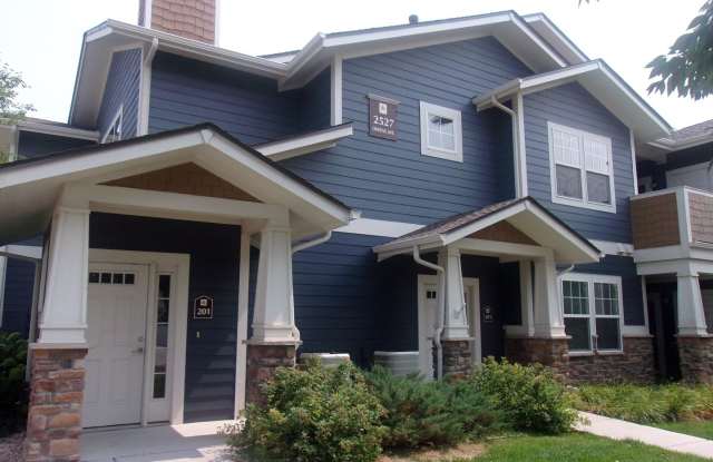 Light-Filled 2 Bed, 2 Bath Condo | Fireplace, Patio & Detached Garage Gallery 1
