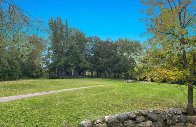 Newly Remodeled Estate Home on 5 Wooded Acres in the Middle of Plymouth!  2 Fireplaces, Vaults, Granite, More! Gallery 3